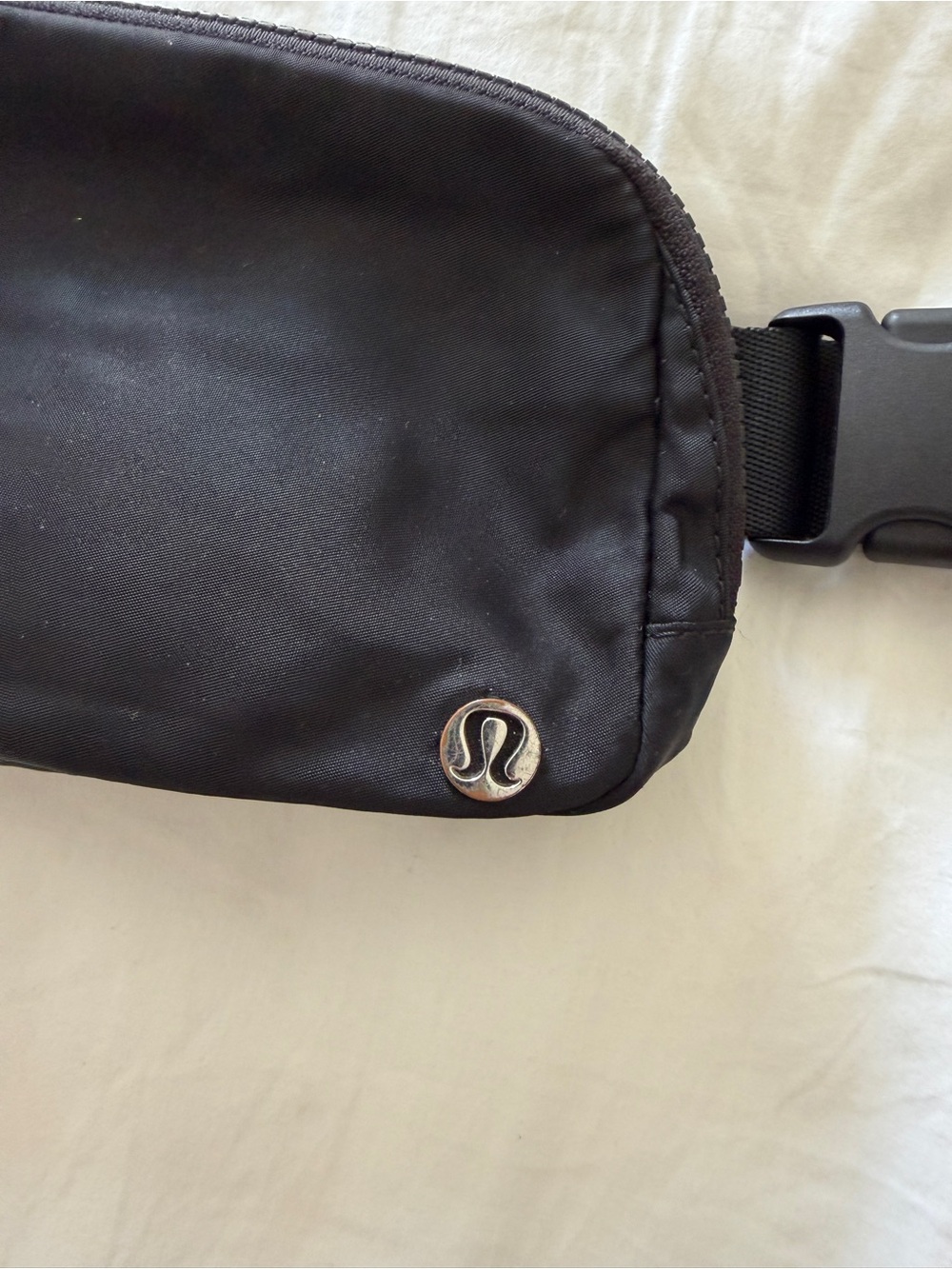 lululemon athletica Black Crossbody Belt Bag with Silver Logo Pin